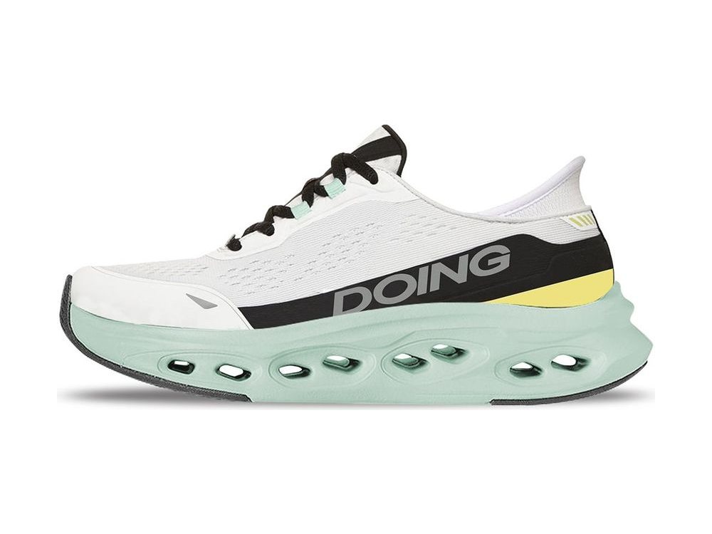 OEM/ODM white mesh running shoe with a black midfoot band, yellow heel wedge, black laces and a mint-green midsole pierced by oval cut-outs, manufactured by DOING Footwear
